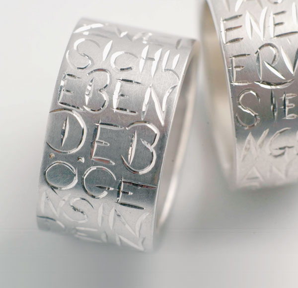 Ringe Silber 925 mit Handgravur: &copy; Zwei sich liebende B&ouml;gen sind ein Herz